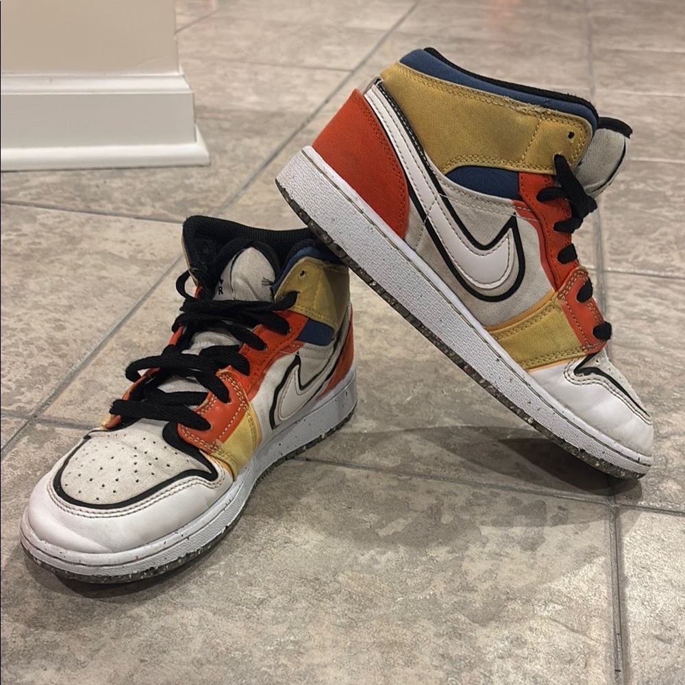 Jordan Orange and Yellow High-Top Sneakers